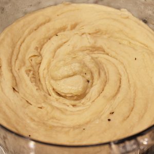 Fully blended roasted garlic and navy bean hummus